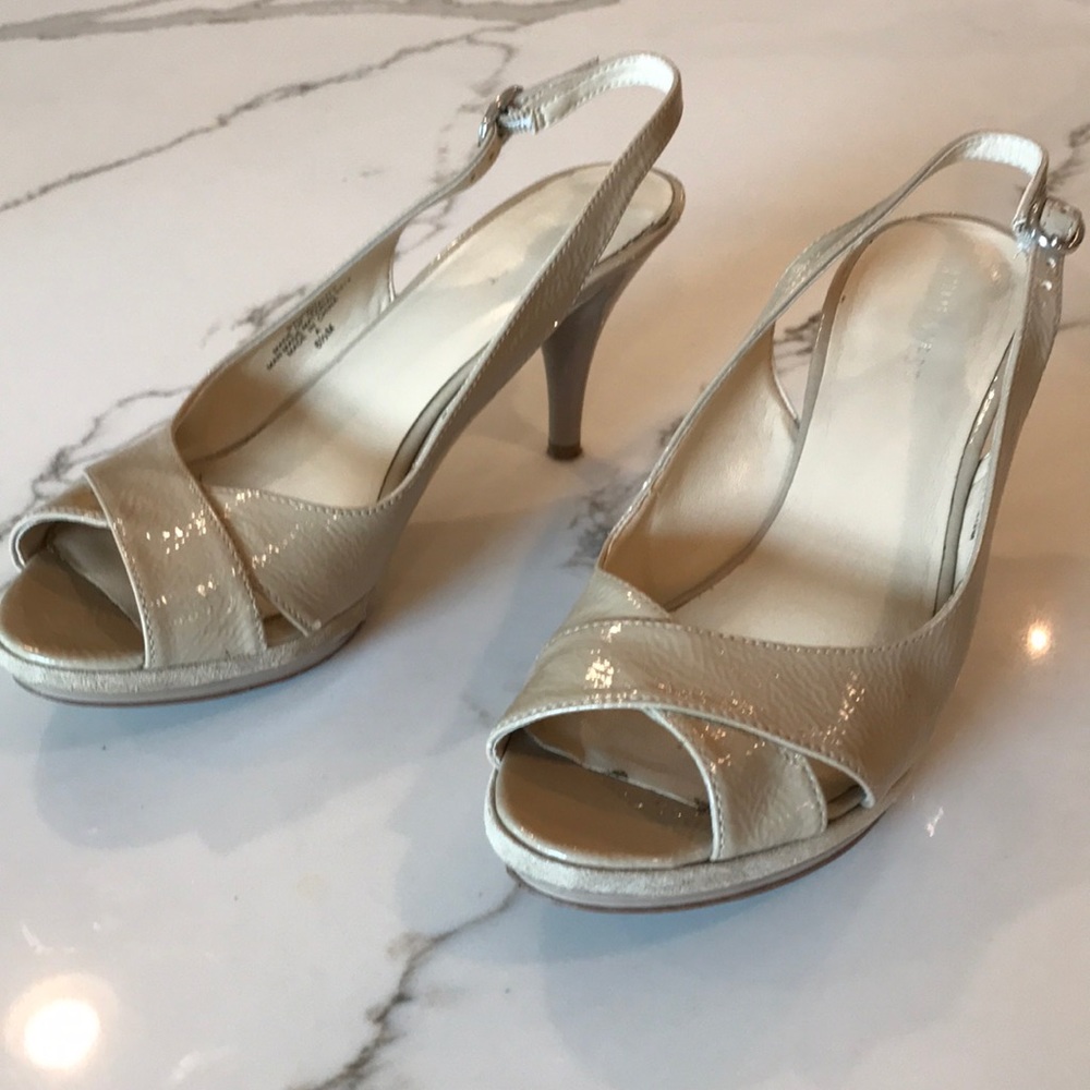 Nine West tan patent sling back heels.
